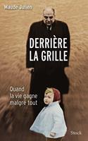   Derrière la grille