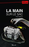   La Main sur le sac