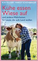   Kühe essen Wiese auf