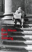   Ein Mann liest Zeitung