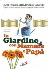 In giardino con mamma e papà