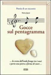 Poesia di un racconto. Gocce sul pentagramma... la cresta dell'onda frange tra i sassi e porta una pietra a forma di cuore... Con CD Audio