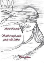 Sabbia negli occhi, petali sulle labbra