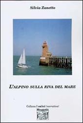 L' alpino sulla riva del mare