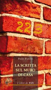 La scritta sul muro di casa